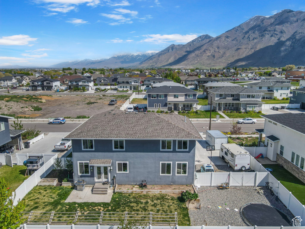 Drone / aerial view with a mountain view and a residential view