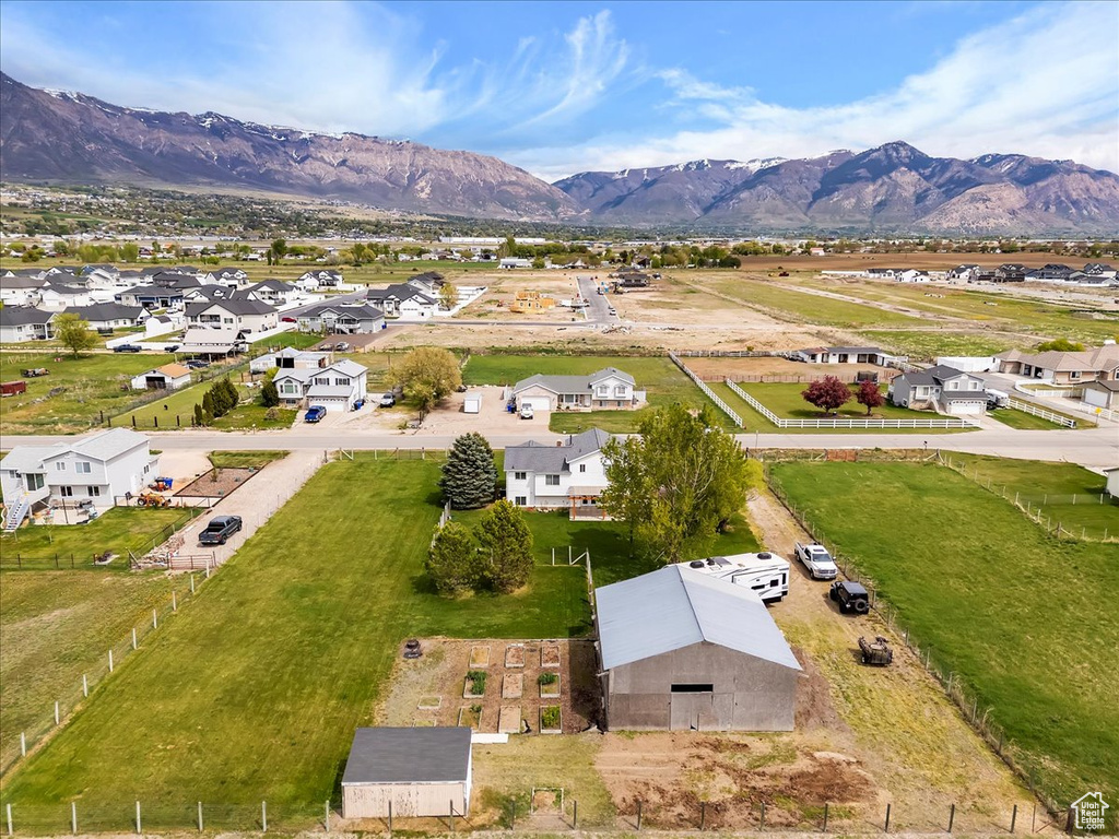 Drone / aerial view featuring a mountain view and a residential view