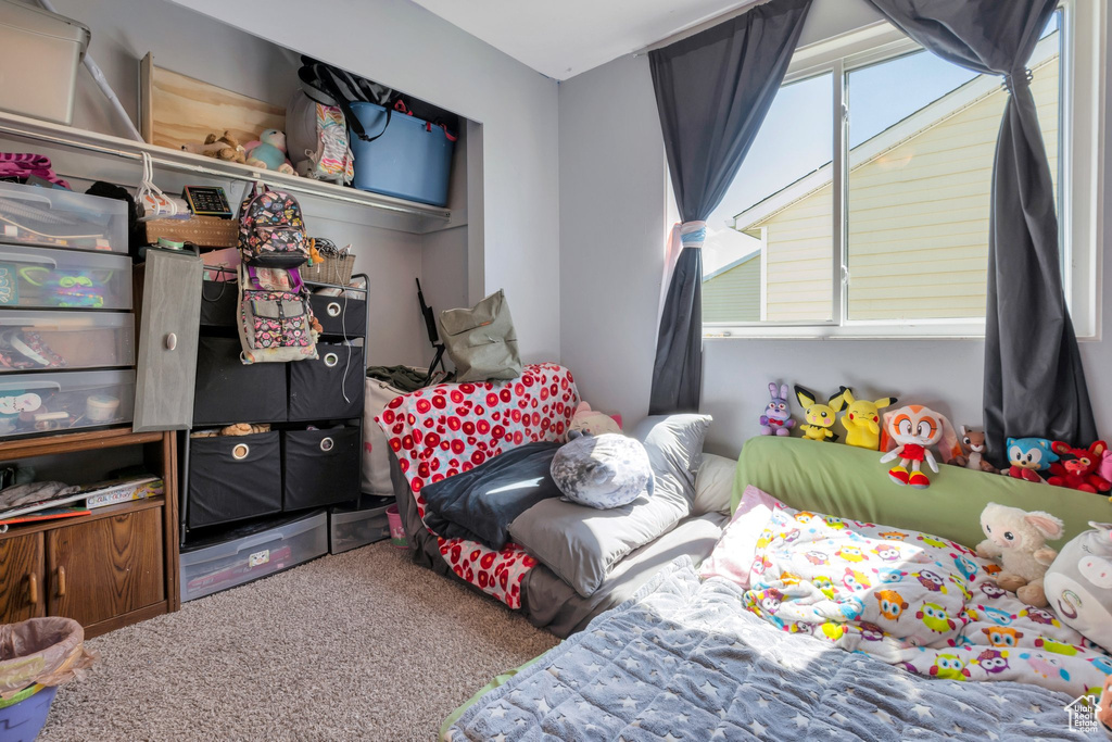 Bedroom featuring carpet floors