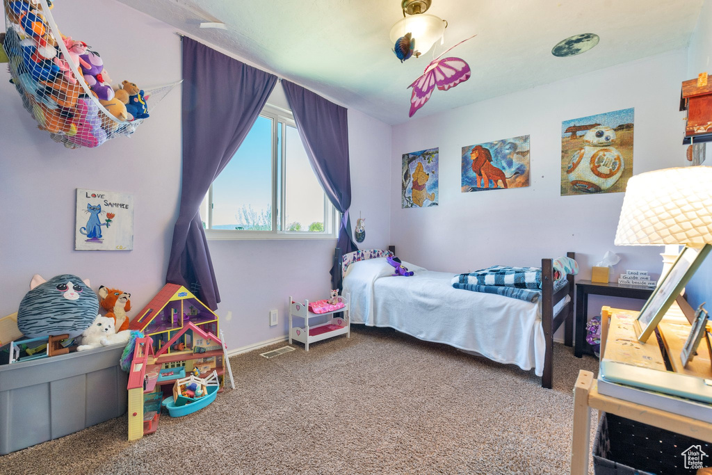 Bedroom featuring carpet