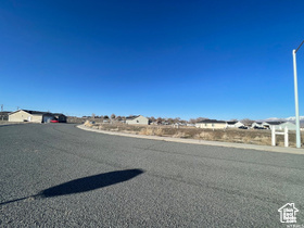 View of street featuring street lighting and curbs