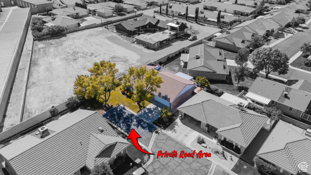 Birds eye view of property with a residential view