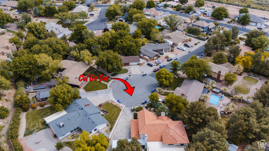 Birds eye view of property with a residential view