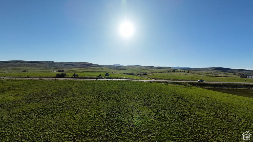 Property view of mountains featuring a rural view