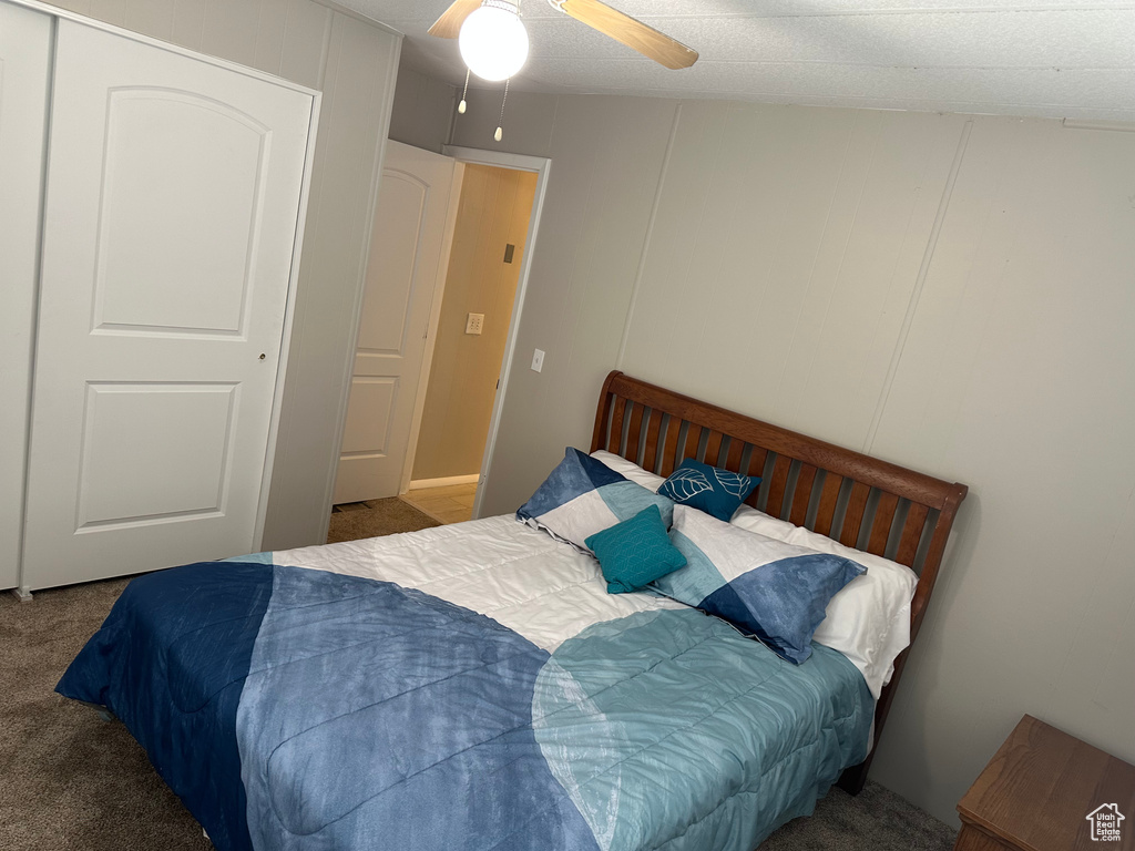 Bedroom featuring carpet flooring and ceiling fan