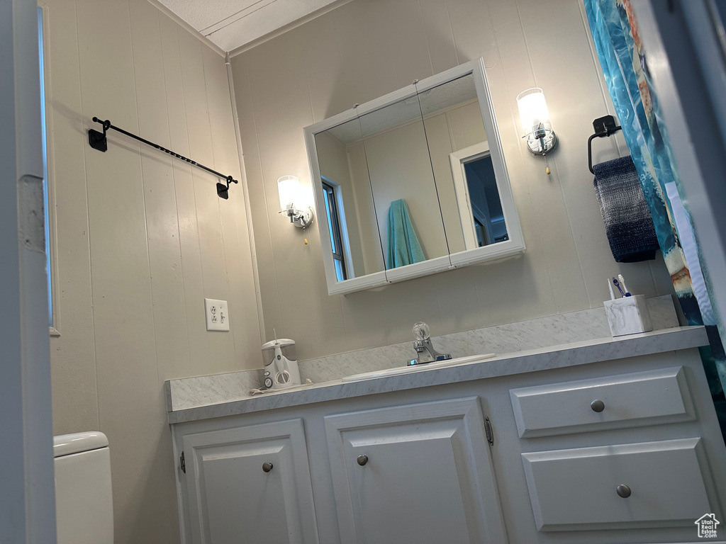 Half bath with toilet and vanity