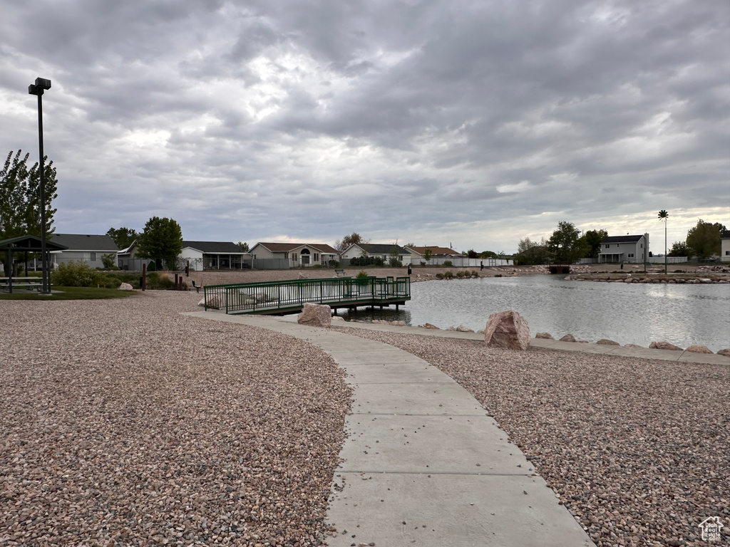 Exterior space featuring a water view and a residential view