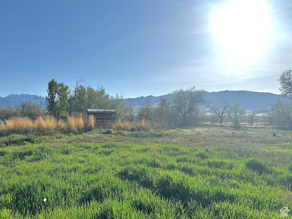 View of mountain feature with a rural view
