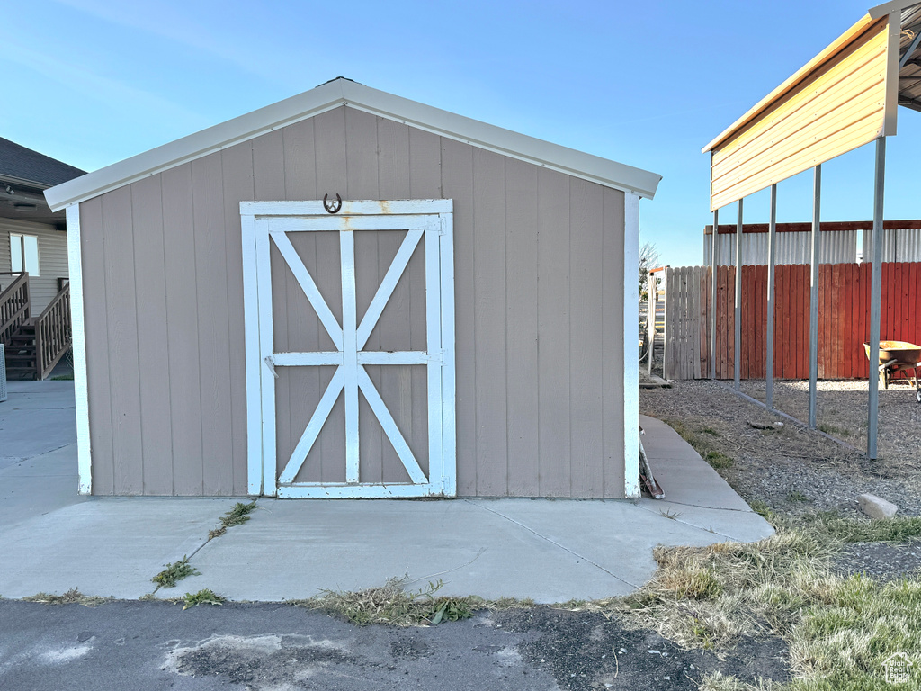 View of shed with fence