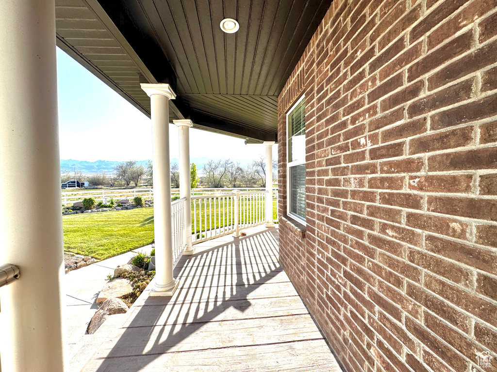 View of patio / terrace featuring covered porch and a mountain view