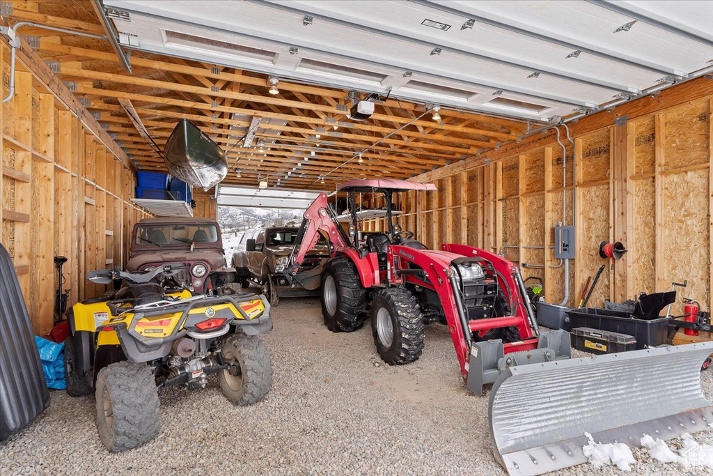 Garage featuring a garage door opener