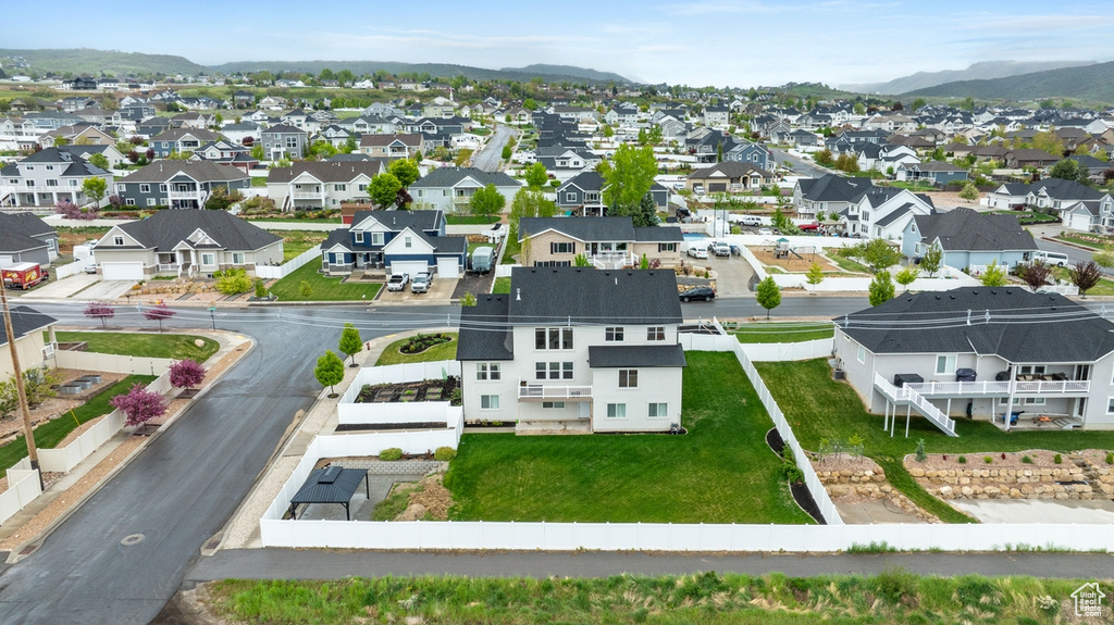 Drone / aerial view featuring a residential view and a mountain view