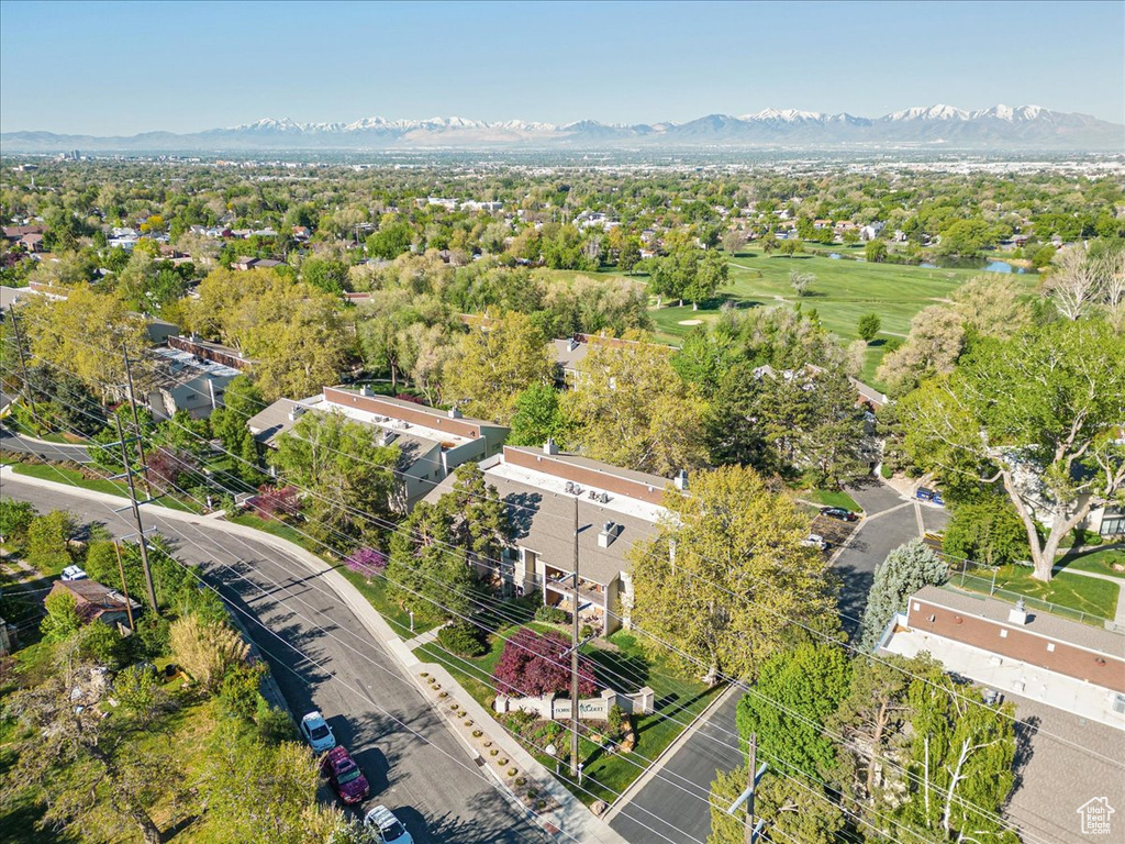 Aerial view featuring a mountain view and golf course view
