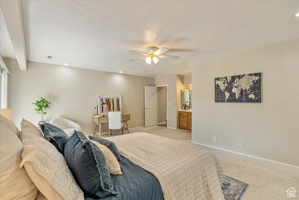 Bedroom featuring light colored carpet, a textured ceiling, recessed lighting, a ceiling fan, and baseboards