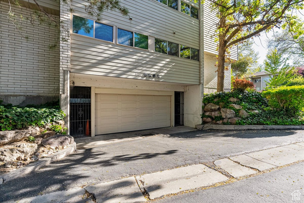 Garage featuring driveway