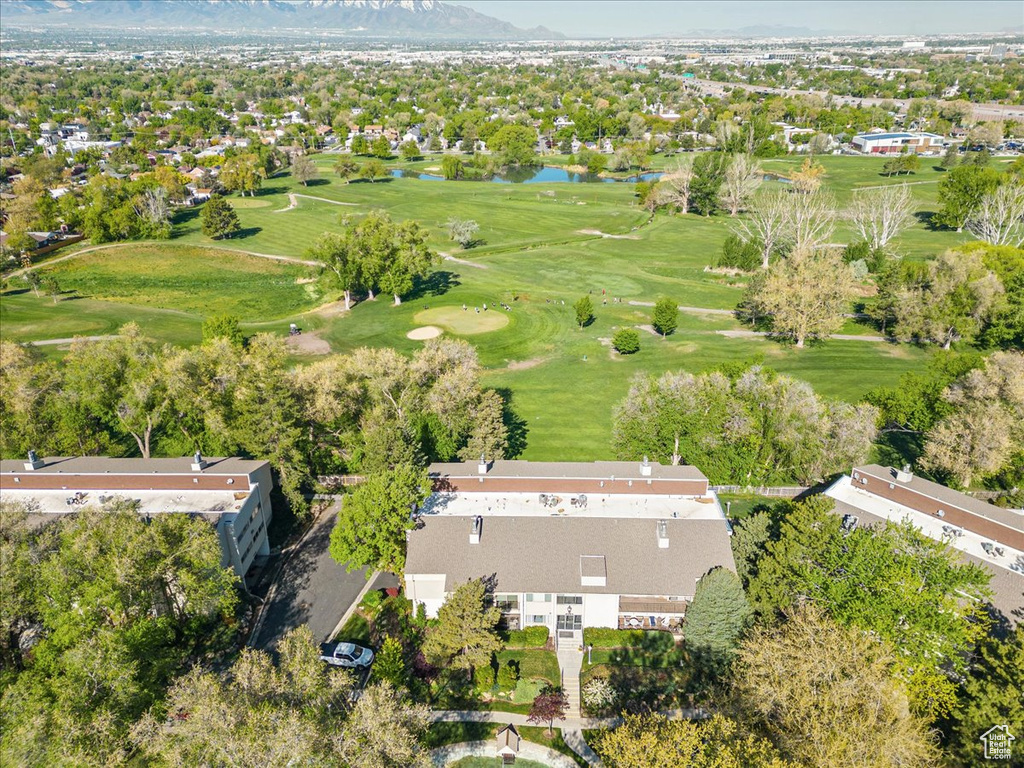 Bird's eye view with a water and mountain view and golf course view