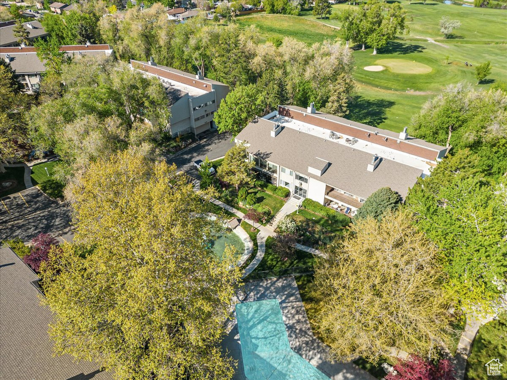 Birds eye view of property with view of golf course