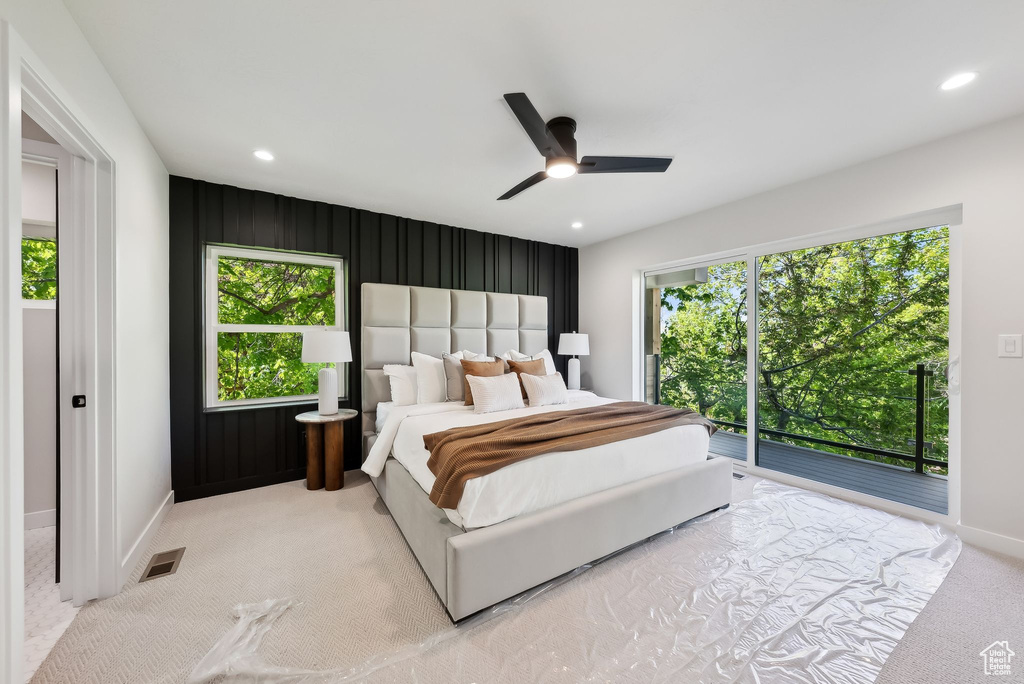 Bedroom featuring carpet floors, visible vents, baseboards, access to outside, and recessed lighting
