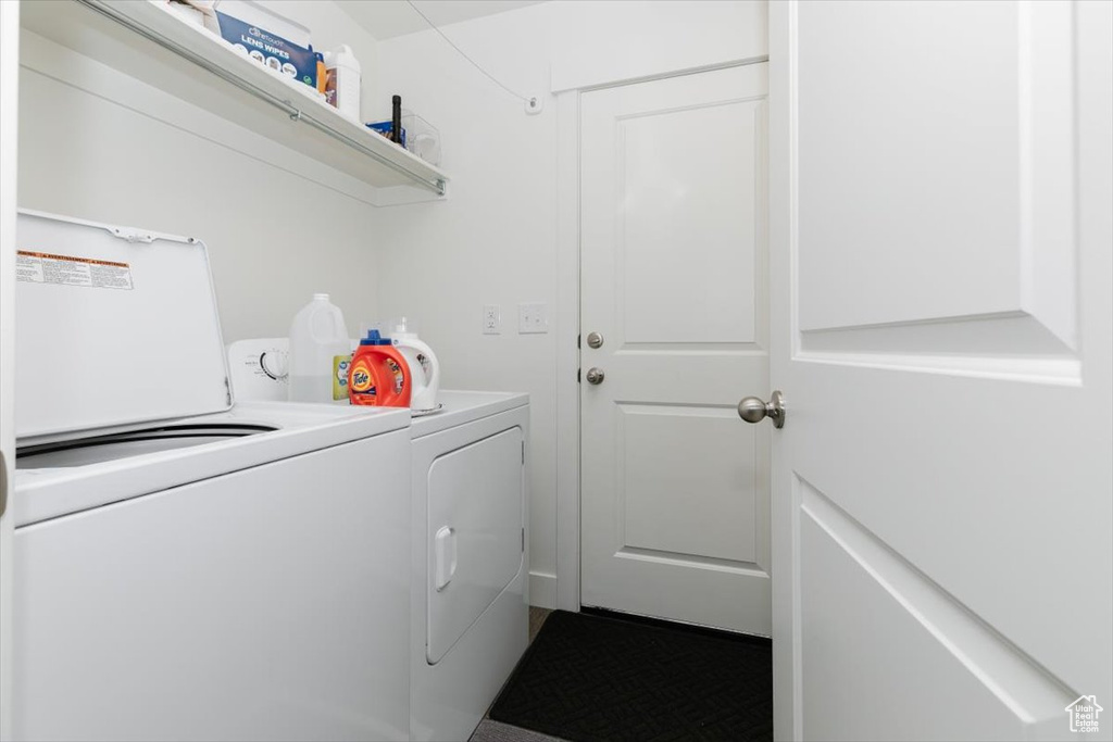 Clothes washing area with laundry area and washer and clothes dryer