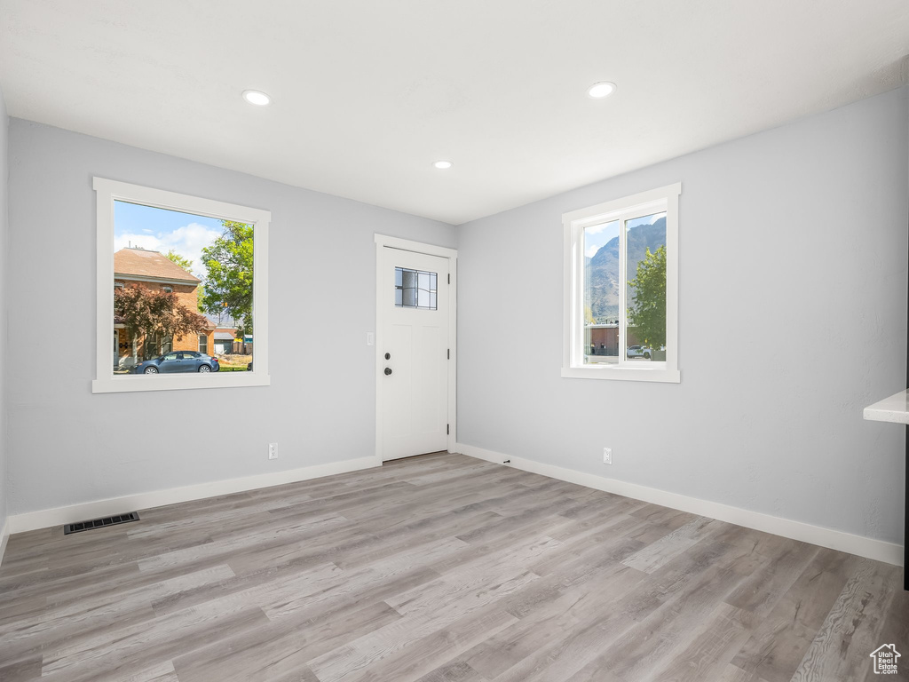Interior space featuring a wealth of natural light, baseboards, and recessed lighting
