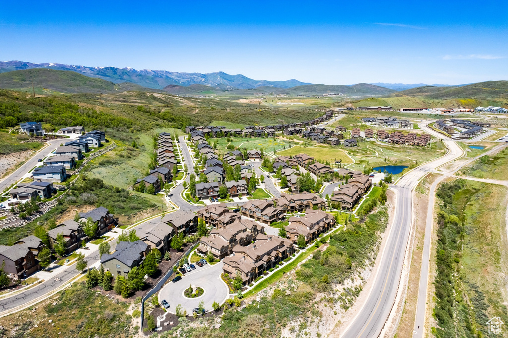 Bird's eye view with a residential view and a water and mountain view