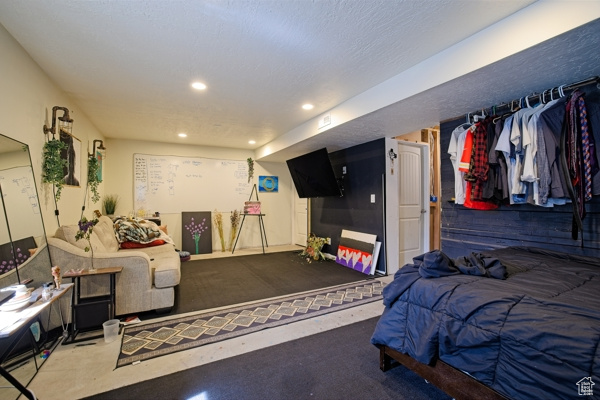 Bedroom featuring recessed lighting