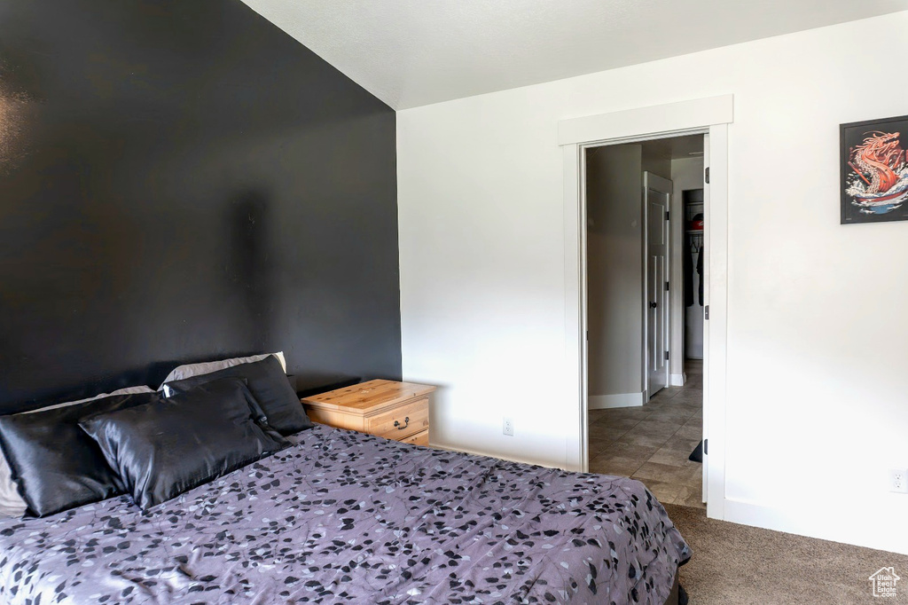 Bedroom with carpet flooring