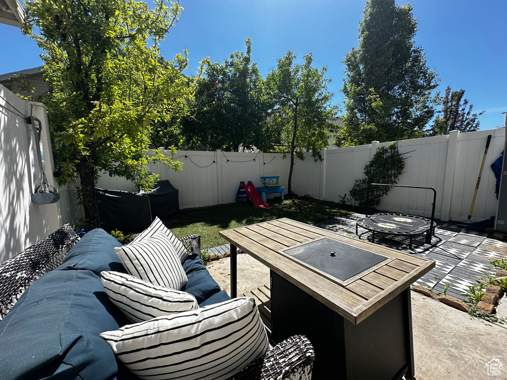View of patio / terrace featuring an outdoor hangout area and a fenced backyard