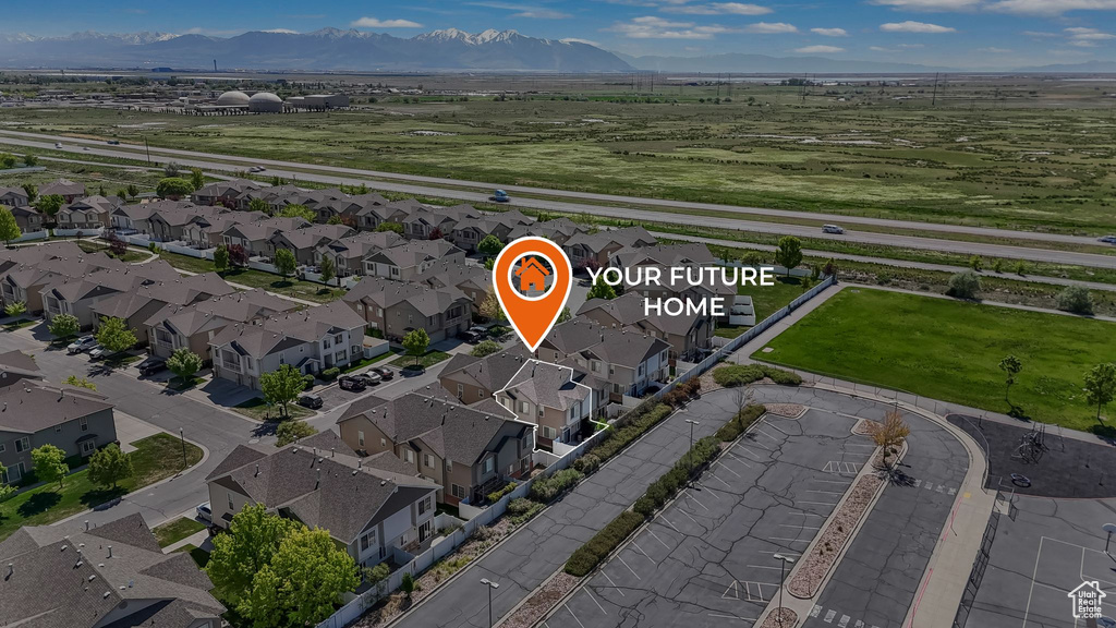 Drone / aerial view with a mountain view and a residential view