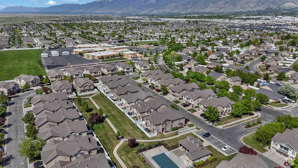 Drone / aerial view featuring a residential view and a mountain view