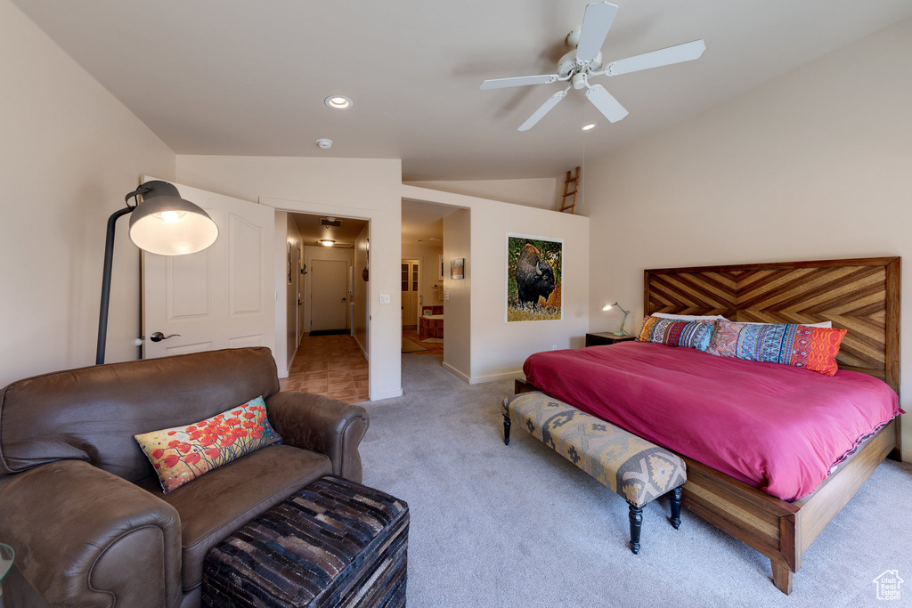Bedroom with recessed lighting, carpet, baseboards, ensuite bathroom, and vaulted ceiling