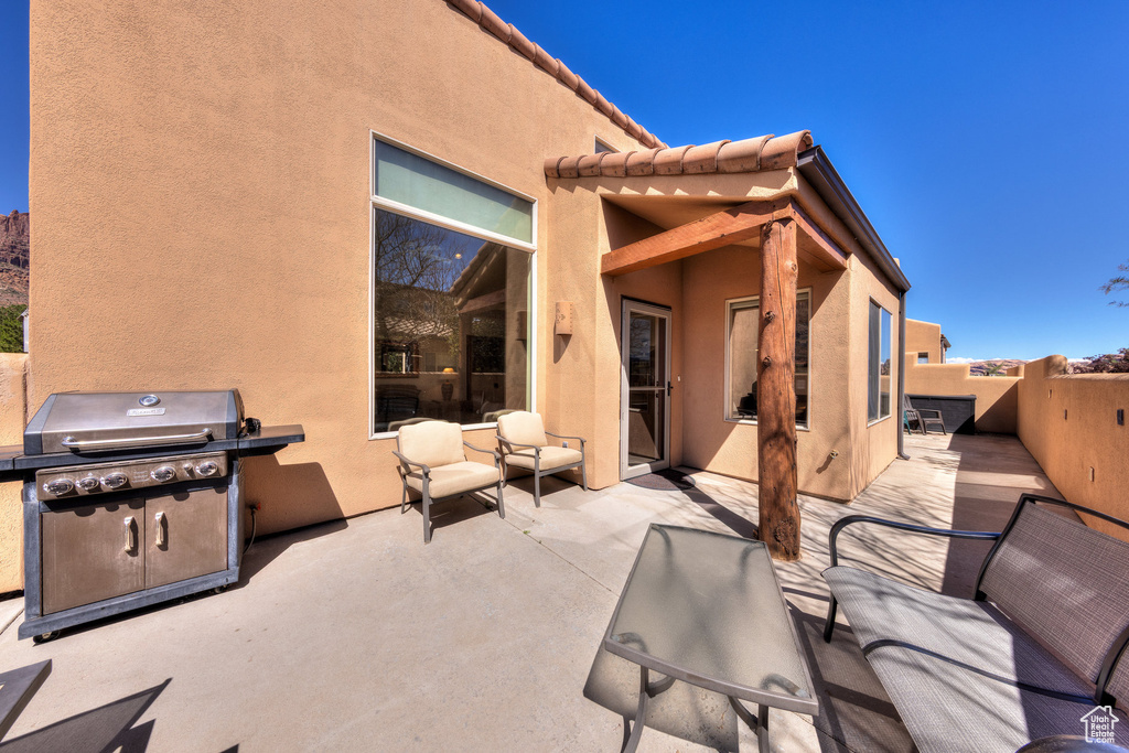 View of patio / terrace featuring fence and area for grilling
