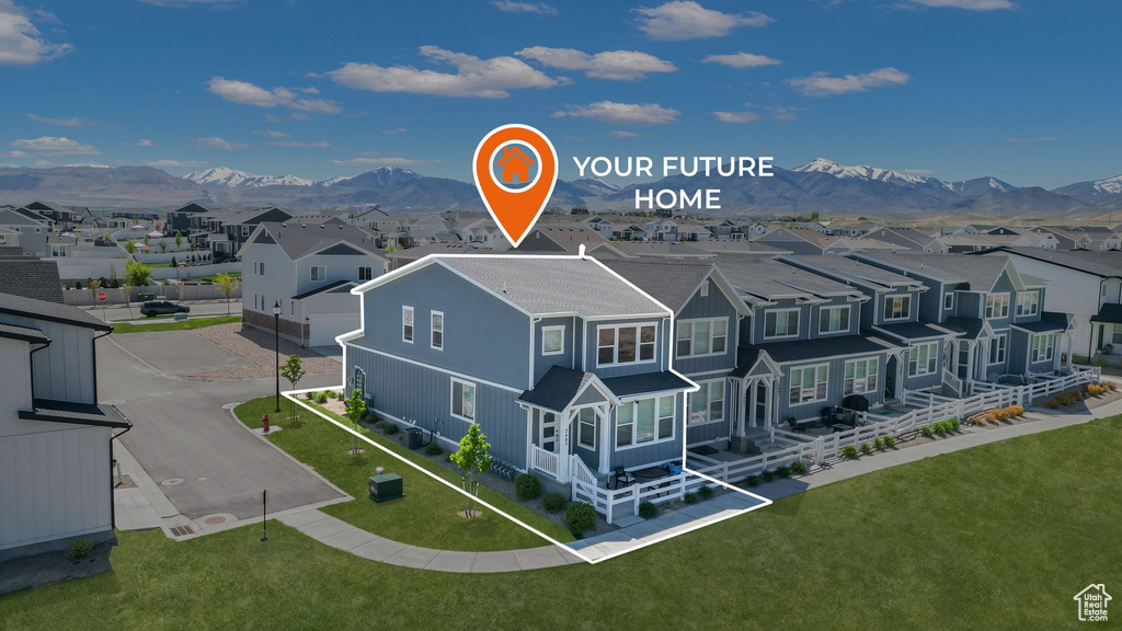 Drone / aerial view with a residential view and a mountain view