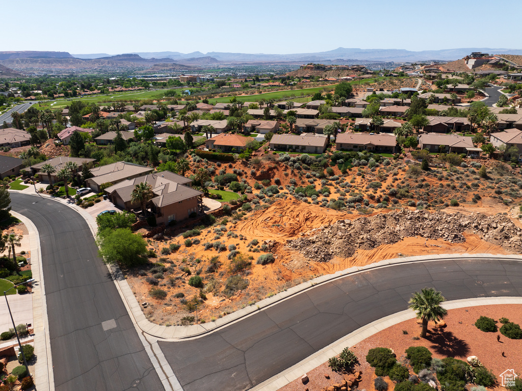 Birds eye view of property with a residential view and a mountain view