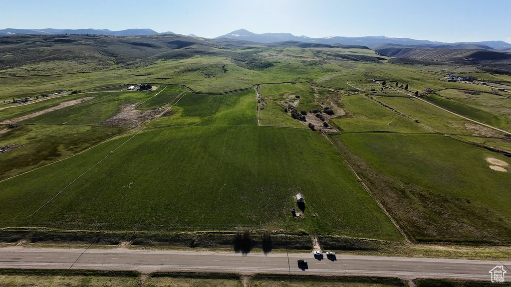 Drone / aerial view featuring a mountain view and a rural view