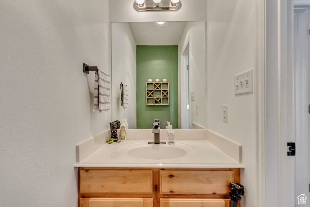 Bathroom with visible vents and vanity