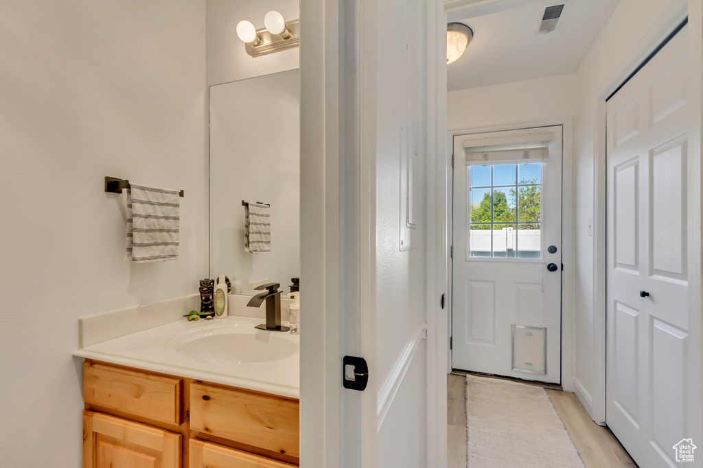 Bathroom featuring vanity and visible vents