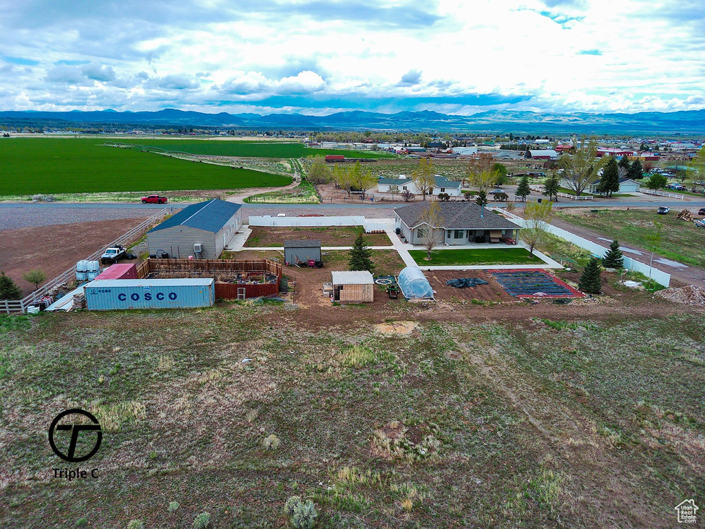 Aerial view of sparsely populated area with mountains