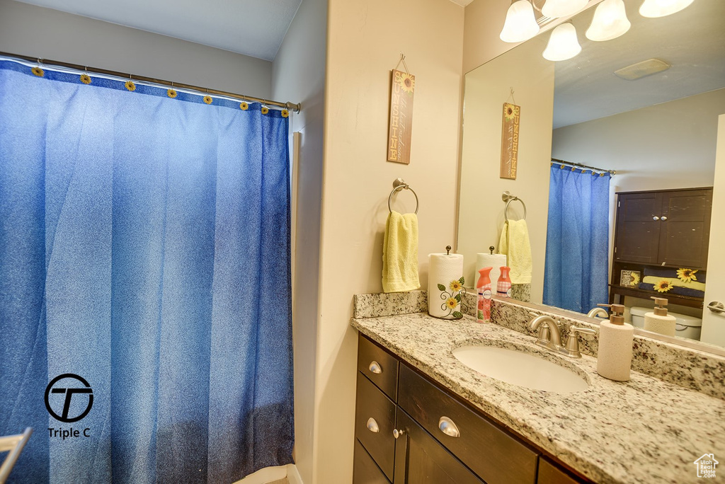 Full bathroom with vanity