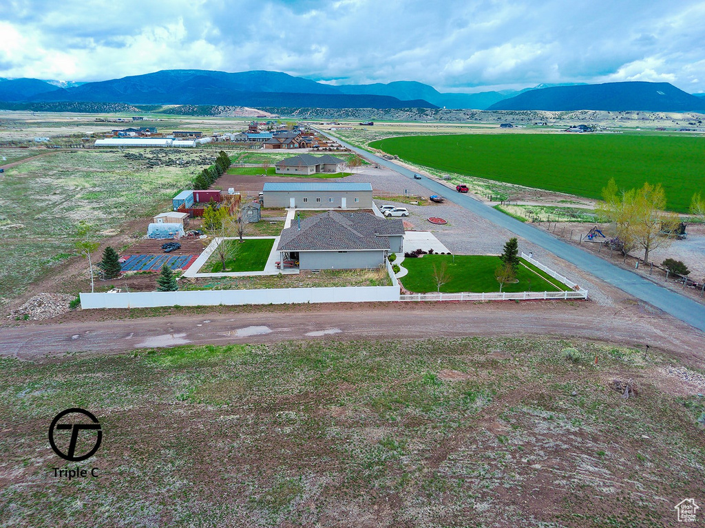 View of subject property featuring a mountain backdrop