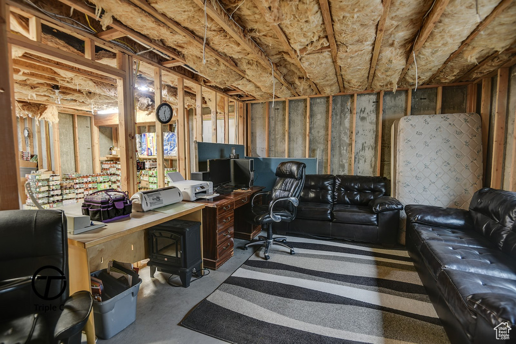 Home office featuring concrete flooring