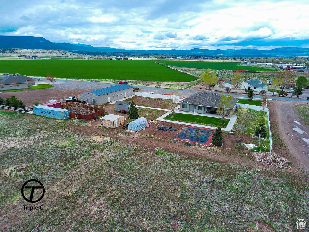 Overview of rural landscape with a mountainous background