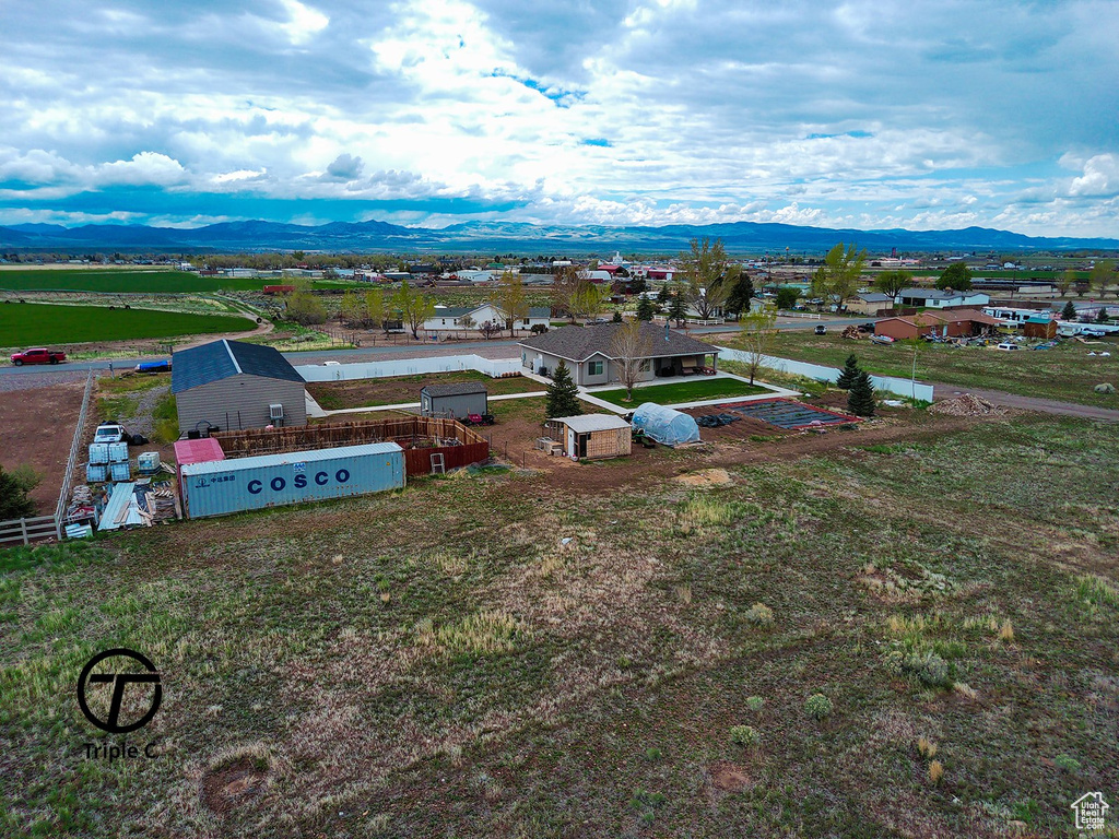 View from above of property with a mountainous background