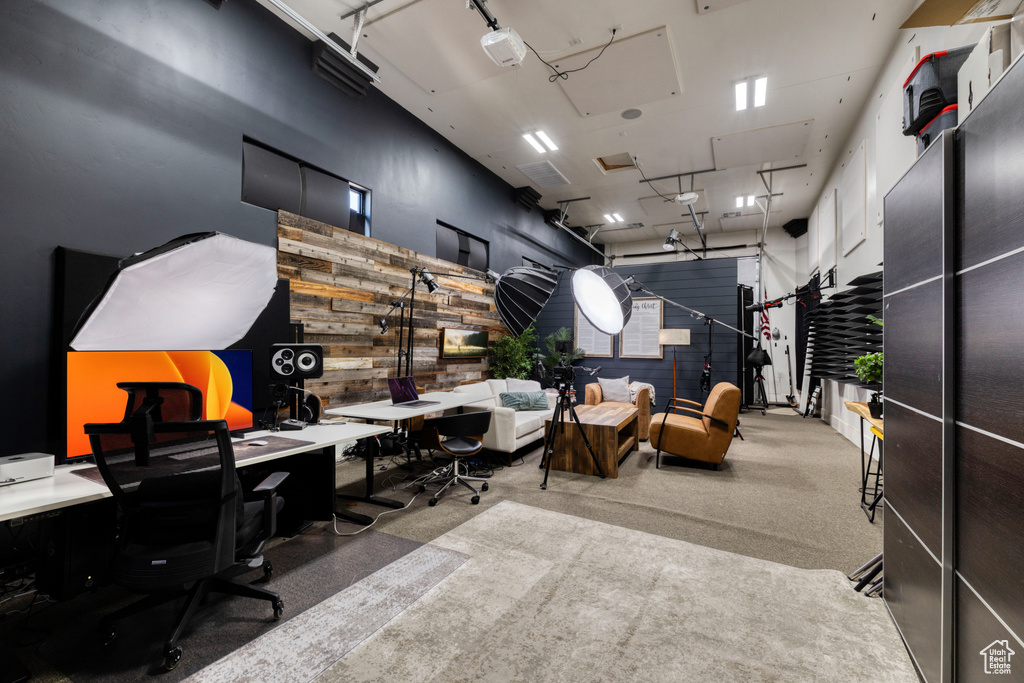Carpeted office featuring a garage