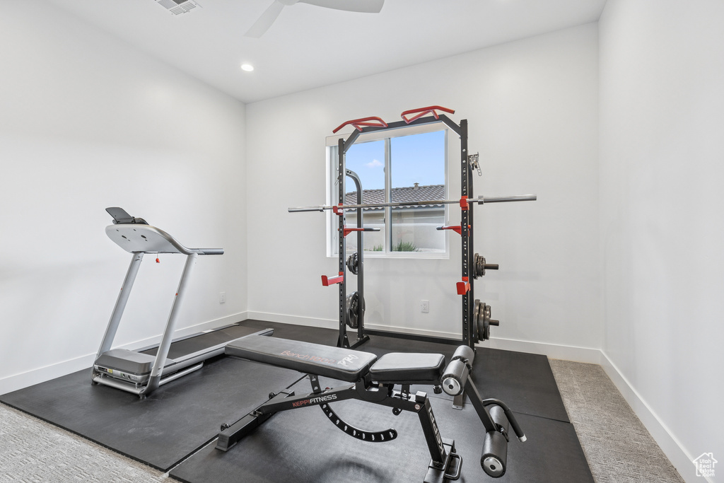Exercise area featuring baseboards, recessed lighting, and ceiling fan