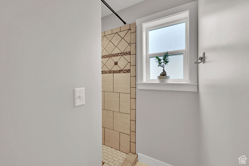 Bathroom with a tile shower