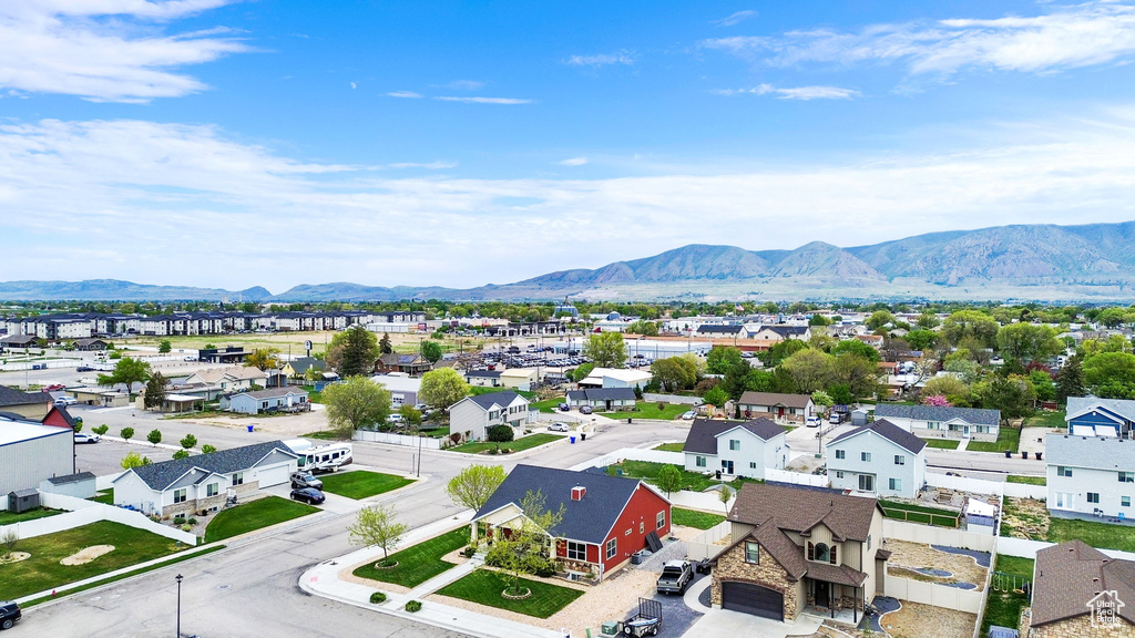 Aerial view of residential area with a mountain backdrop