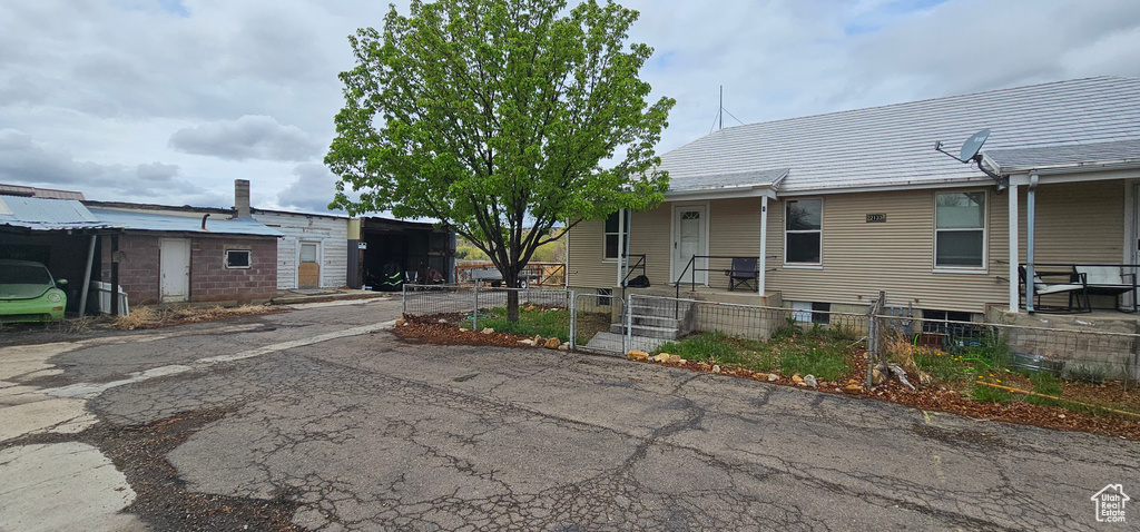 View of front of property with a fenced front yard