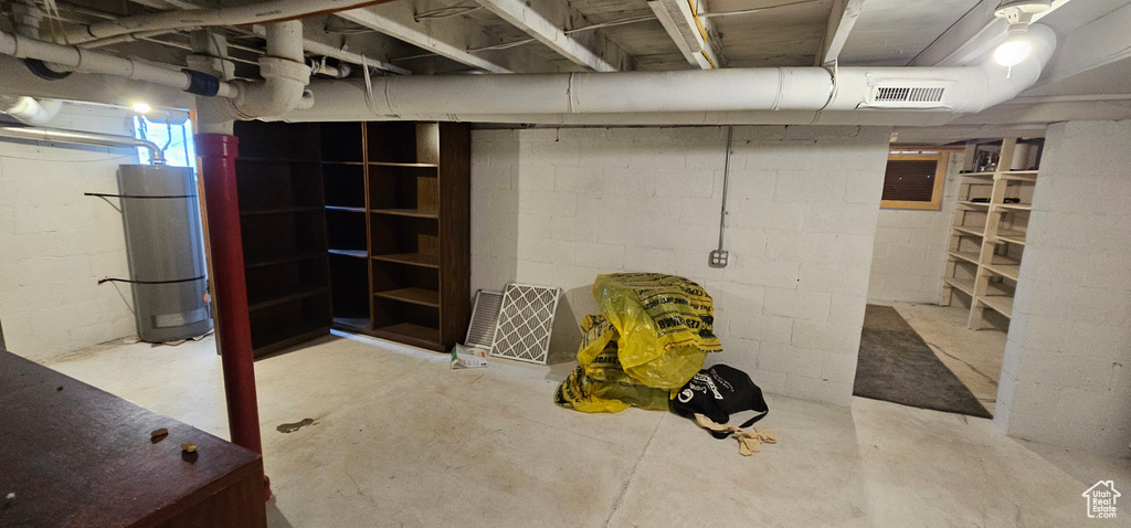 Unfinished basement featuring visible vents