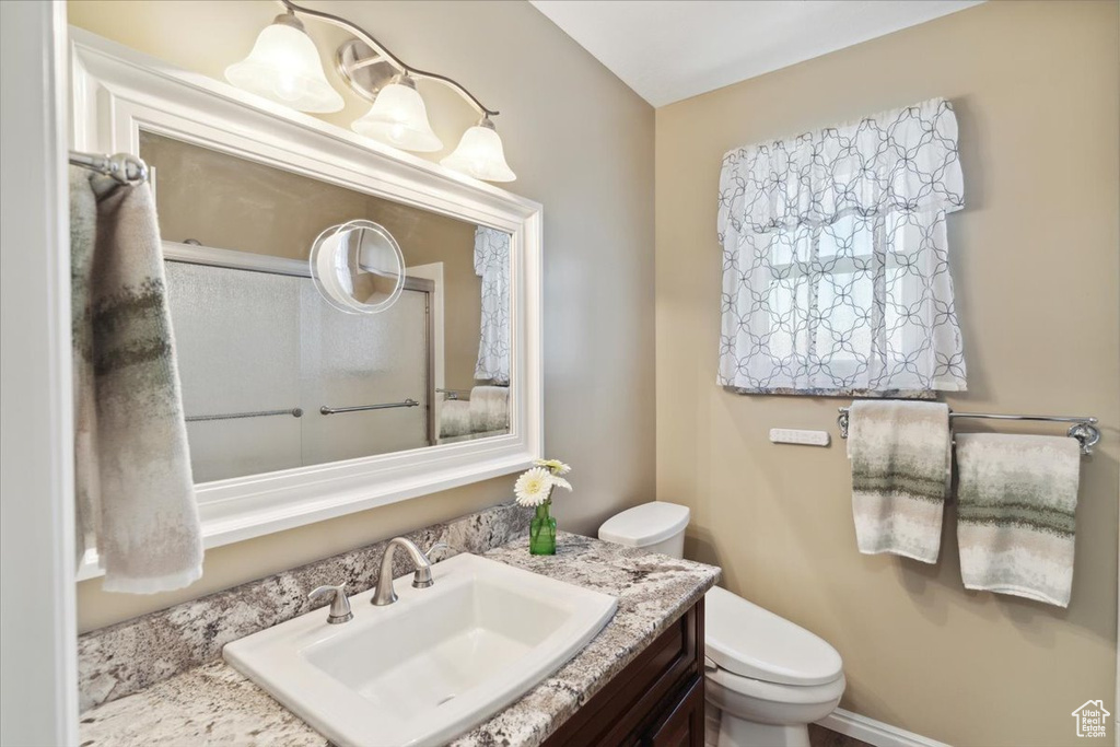 Bathroom with toilet and vanity